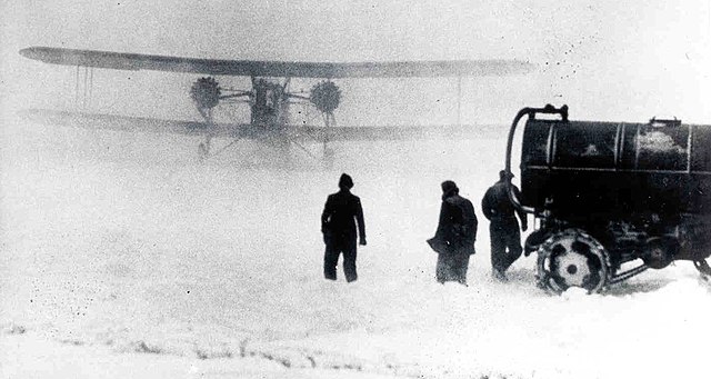 Twin-engine air mail plane of the US Army Air Corps in snow storm