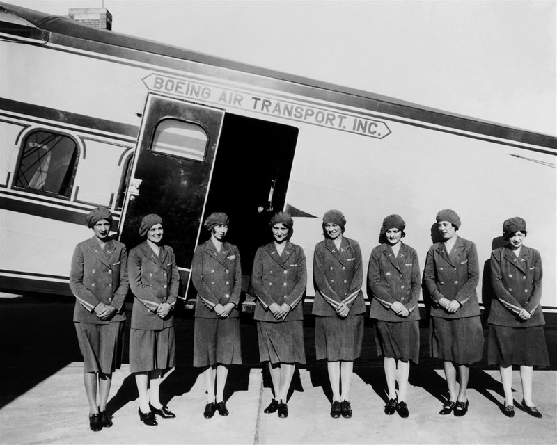 The first eight airline stewardesses, in front of a Boeing air Transport plane, Boeing Model 80A